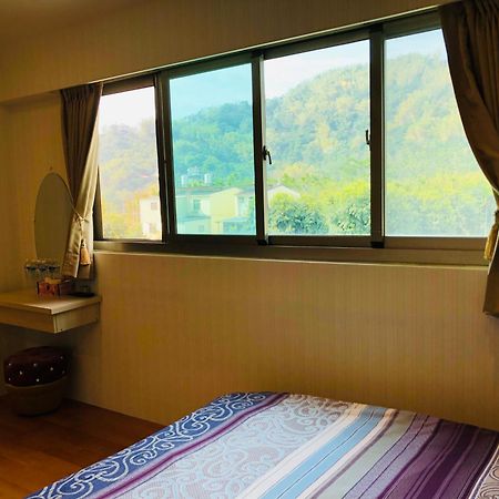 Chong Er Ya She Homestay Jiji Zimmer foto
