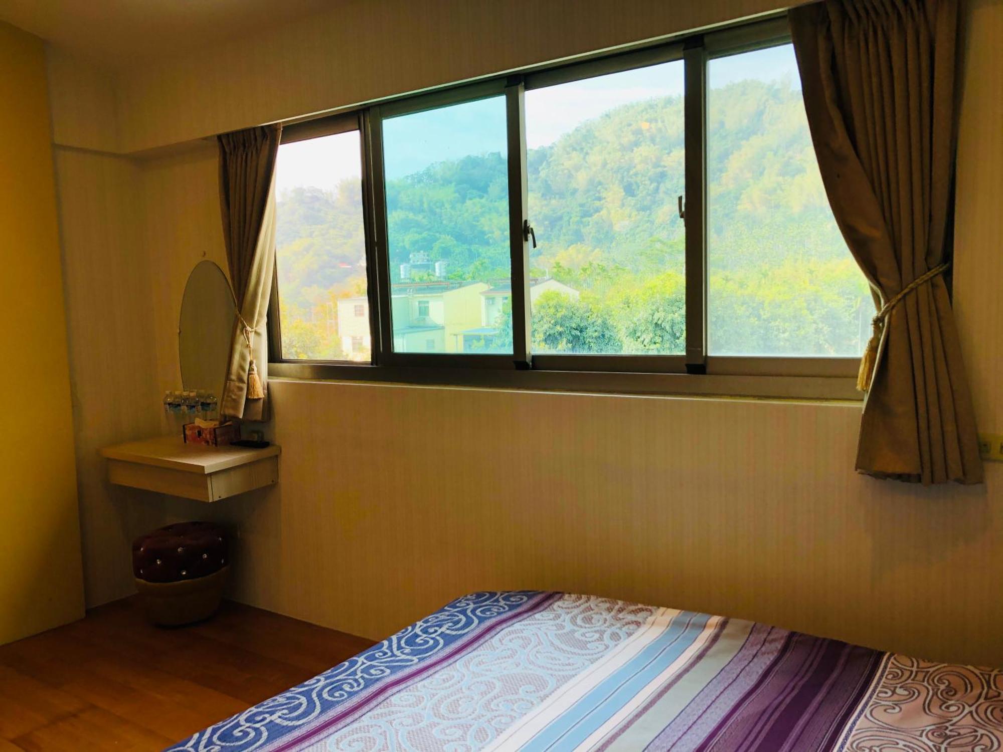 Chong Er Ya She Homestay Jiji Zimmer foto
